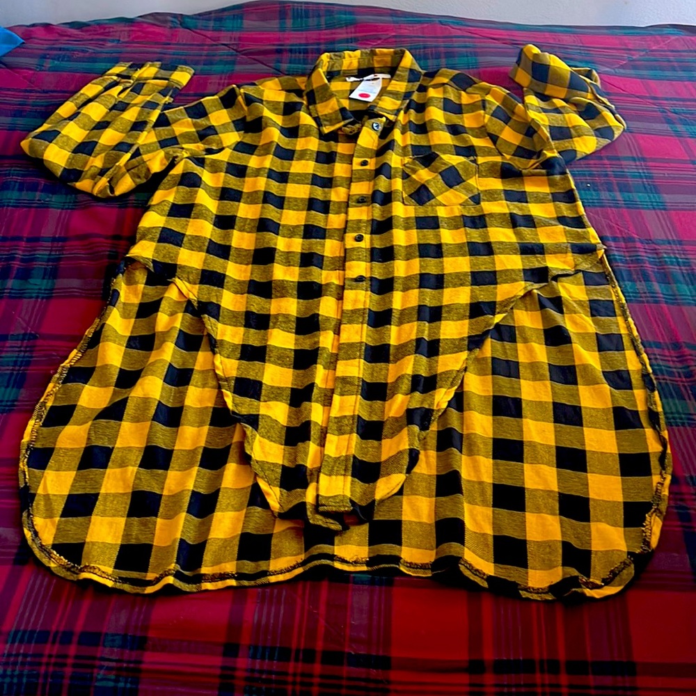 Plaid long shirt dress with long sleeves.